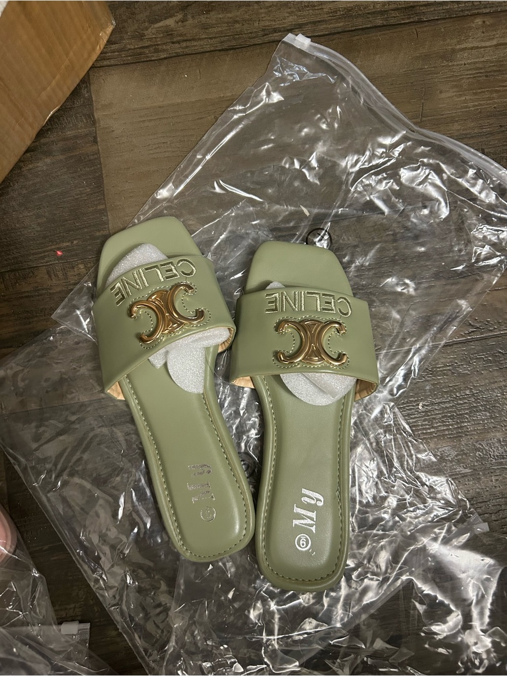 Celine Sage Green Logo Slide Mules with Gold Hardware